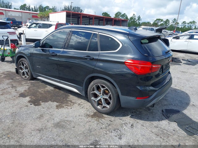2016 BMW X1 WBXHT3C30G5E48257 Photo 2