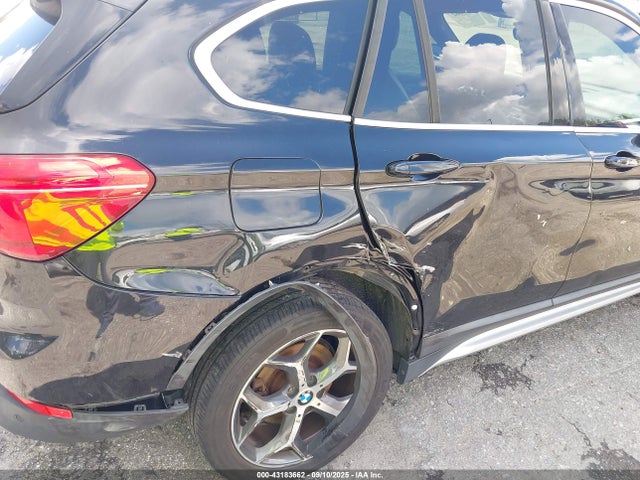 2016 BMW X1 WBXHT3C30G5E48257 Photo 5