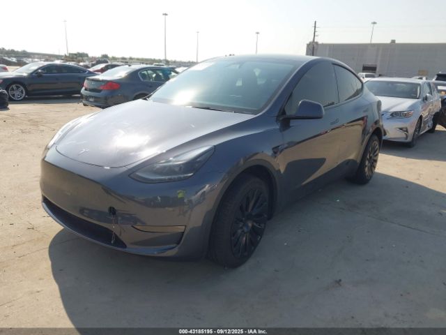 2023 TESLA MODEL Y 7SAYGDEE0PA208949 Photo 1