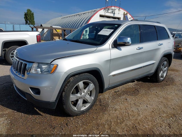 2011 JEEP GRAND CHEROKEE 1J4RR6GT4BC544402 Photo 1