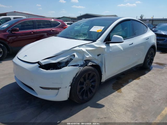 2023 TESLA MODEL Y 7SAYGAEE7PF662925 Photo 1