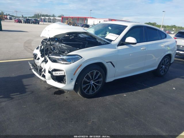 2020 BMW X6 5UXCY4C00L9C89228 Photo 1