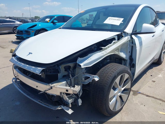 2023 TESLA MODEL Y 7SAYGDEE8PF887131 Photo 5