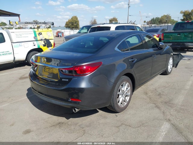 JM1GJ1U56G1428747 Mazda py