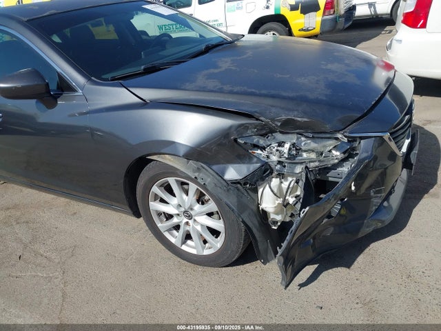 JM1GJ1U56G1428747 Mazda py