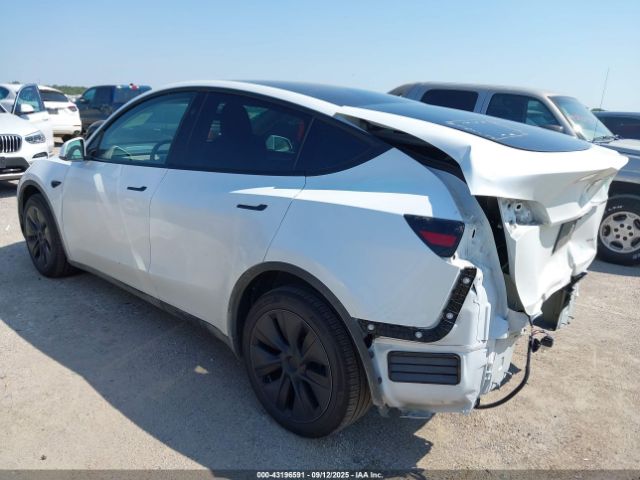 2025 TESLA MODEL Y 7SAYGDEE3SA343397 Photo 2