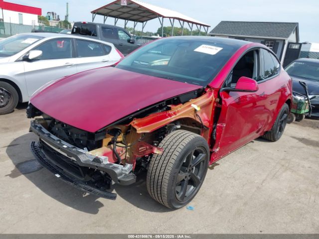 2026 TESLA MODEL Y 7SAYGDEE6TF360599 Photo 1
