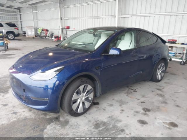 2024 TESLA MODEL Y 7SAYGDEE3RA268033 Photo 1