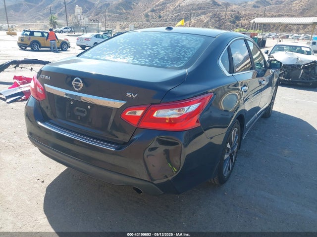1N4AL3AP5GC119346 Nissan 2016