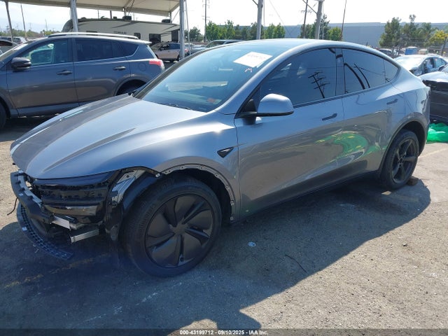 2026 TESLA MODEL Y 7SAYGDEE0TF360694 Photo 1