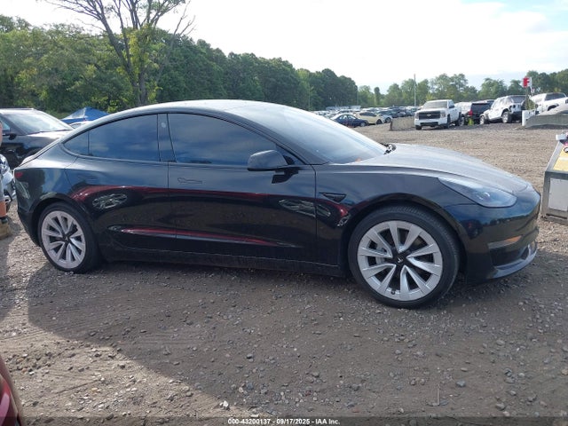5YJ3E1EA8MF990702 Tesla 2021