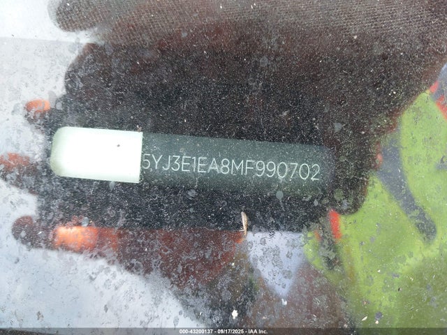 5YJ3E1EA8MF990702 Tesla 2021