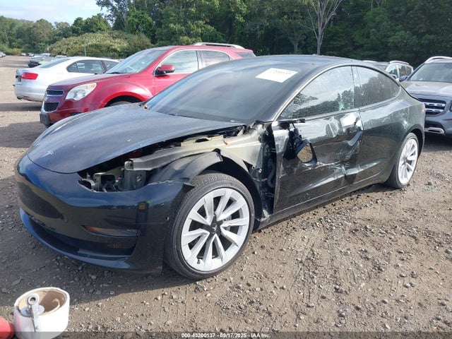 5YJ3E1EA8MF990702 Tesla 2021