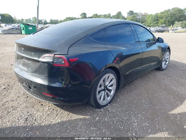5YJ3E1EA8MF990702 Tesla 2021