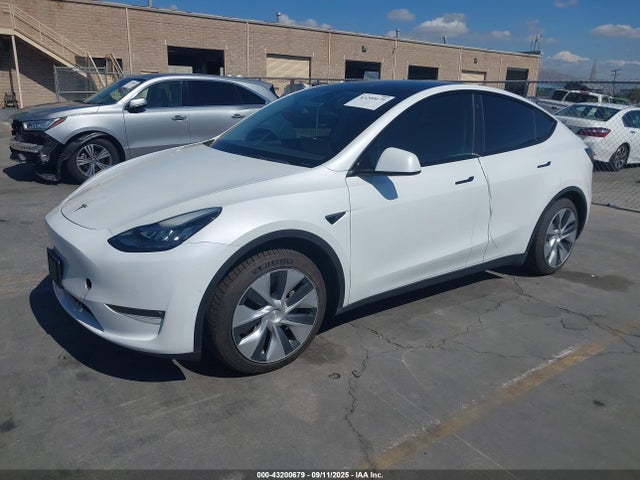 2021 TESLA MODEL Y 5YJYGAEE6MF149934 Photo 1