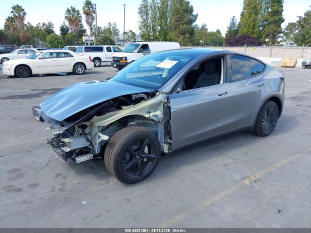 2026 TESLA MODEL Y 7SAYGDEE9TF357034 Photo 1