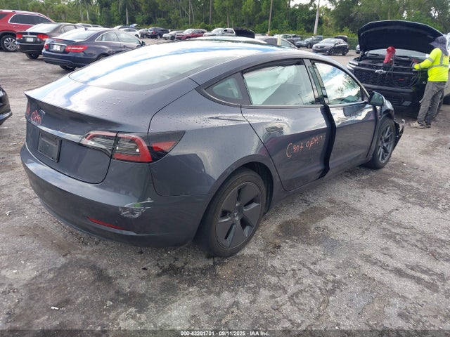 2023 Tesla Model 3 Rear-wheel Drive მანქანა იყიდება აუქციონზე, vin: 5YJ3E1EA3PF705179, აუქციონის ნომერი: 43201701
