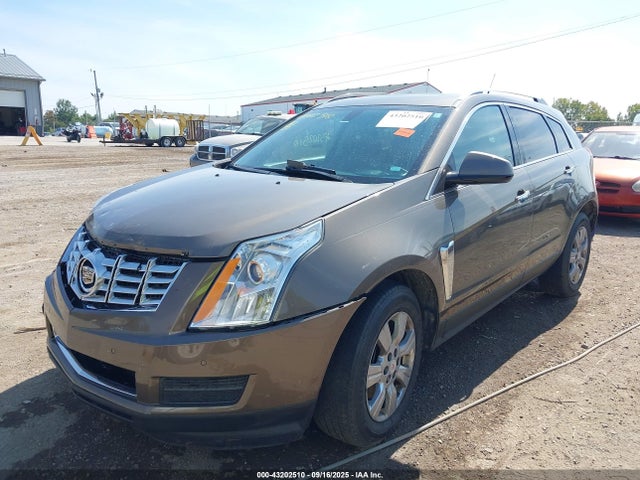2014 CADILLAC SRX 3GYFNEE35ES676501 Photo 1