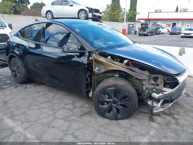 2024 TESLA MODEL Y 7SAYGDED1RF122837 Photo 0