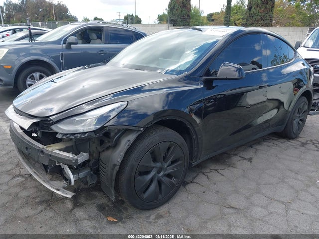 2024 TESLA MODEL Y 7SAYGDED1RF122837 Photo 1