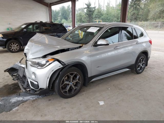 2017 BMW X1 WBXHT3Z33H4A54881 Photo 1