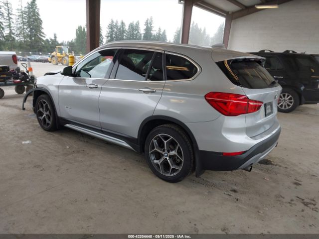 2017 BMW X1 WBXHT3Z33H4A54881 Photo 2