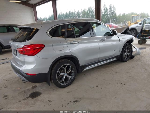2017 BMW X1 WBXHT3Z33H4A54881 Photo 3