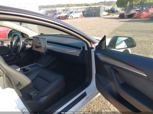 2023 TESLA MODEL 3 5YJ3E1EAXPF511717 Photo 4
