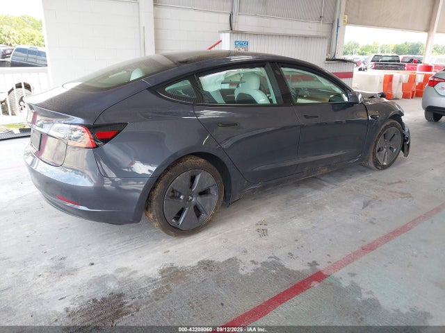 2023 TESLA MODEL 3 5YJ3E1EAXPF670060 Photo 3