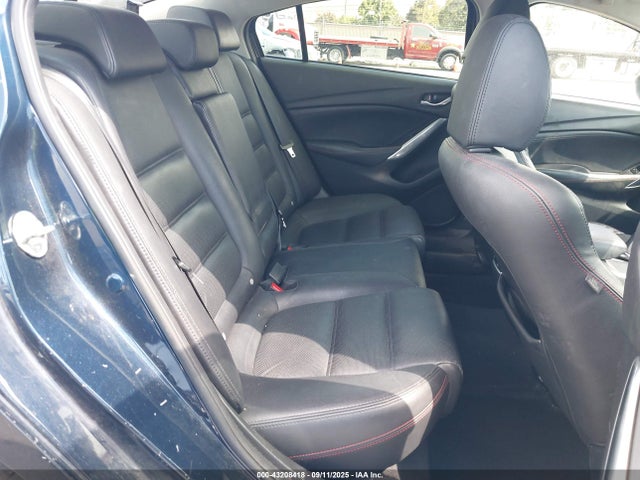 JM1GJ1W63F1174029 Mazda py