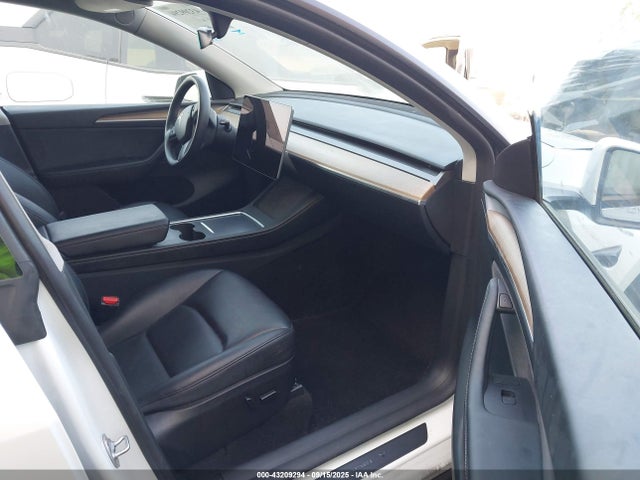 2023 TESLA MODEL Y 7SAYGDEF6PF807723 Photo 4