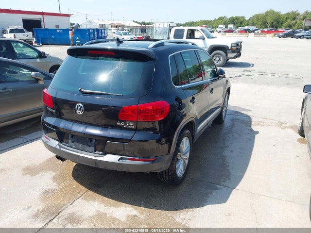 WVGBV3AX9EW557576 Volkswagen Tiguan