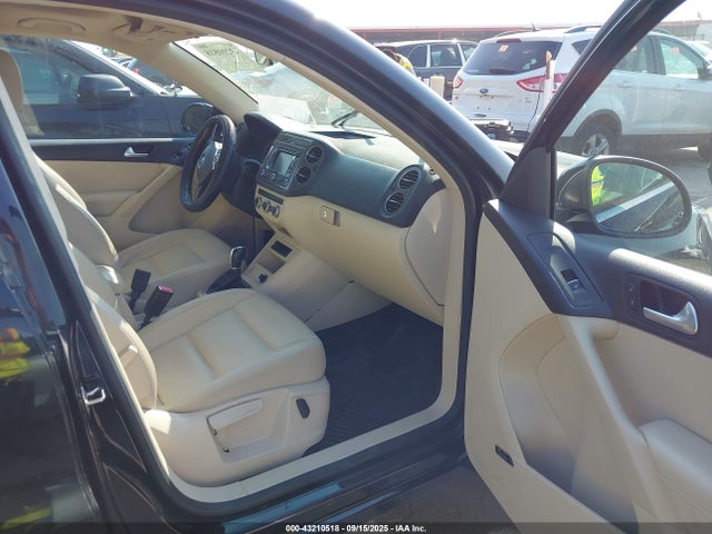 WVGBV3AX9EW557576 Volkswagen Tiguan