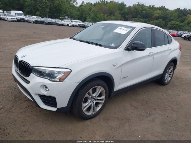 2015 BMW X4 5UXXW3C50F0F88854 Photo 1