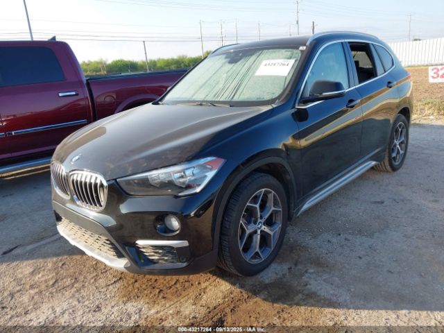 2019 BMW X1 WBXHU7C50K3H46611 Photo 1