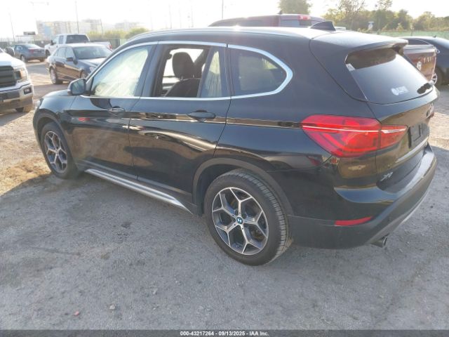 2019 BMW X1 WBXHU7C50K3H46611 Photo 2