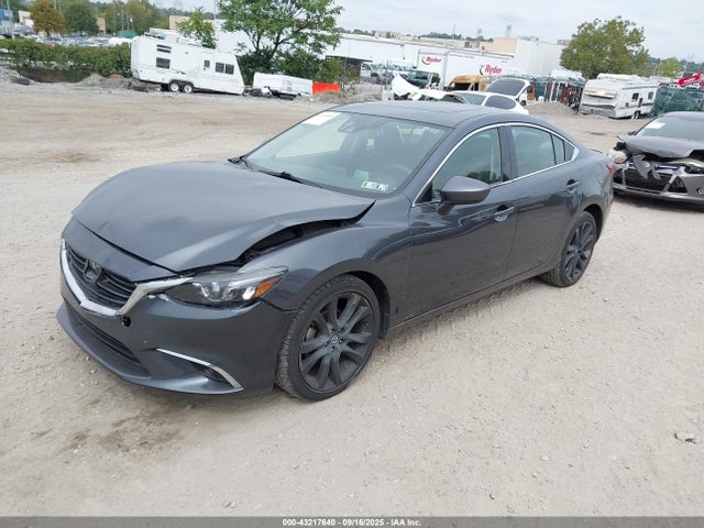 JM1GJ1W5XG1431440 Mazda py