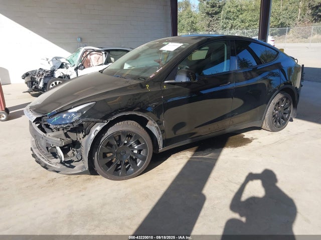 2023 TESLA MODEL Y 7SAYGAEE4PF932404 Photo 1