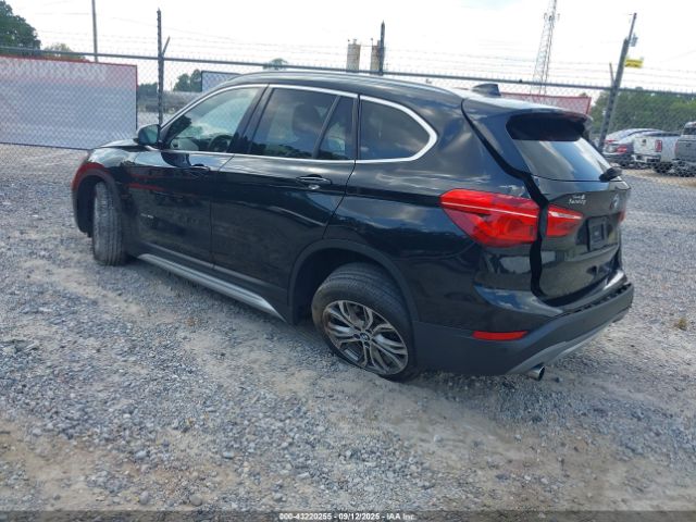 2016 BMW X1 WBXHT3C32G5E50186 Photo 2