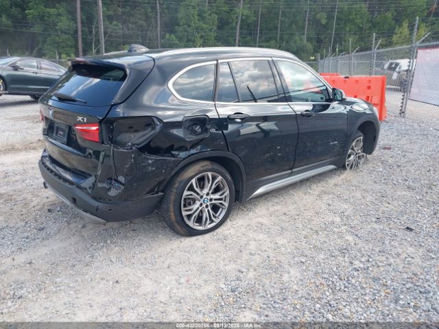 2016 BMW X1 WBXHT3C32G5E50186 Photo 3