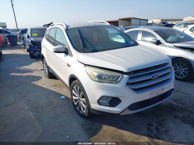 Продажа на аукционе авто 2017 Ford Escape Titanium, vin: 1FMCU9JD0HUD84692, номер лота: 43220697