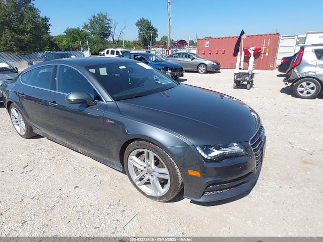 2014 AUDI A7 WAU2GAFC3EN083331 Photo 0