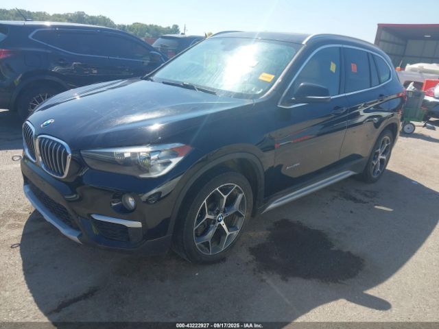 2016 BMW X1 WBXHT3C32GP884433 Photo 1