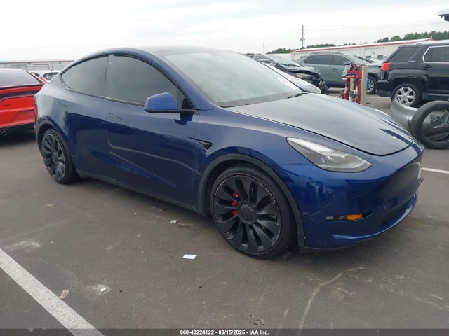 2021 TESLA MODEL Y 5YJYGDEFXMF194711 Photo 0