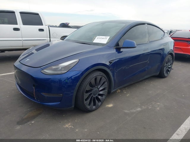 2021 TESLA MODEL Y 5YJYGDEFXMF194711 Photo 1