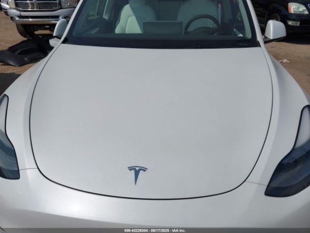 2023 TESLA MODEL Y 7SAYGAEE6PF661250 Photo 9