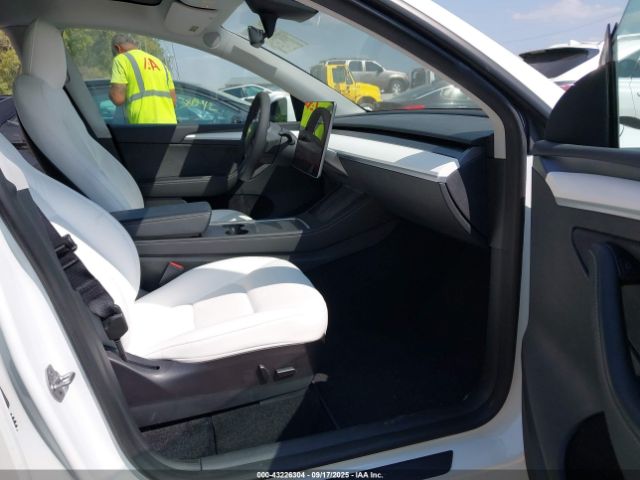 2023 TESLA MODEL Y 7SAYGAEE6PF661250 Photo 4