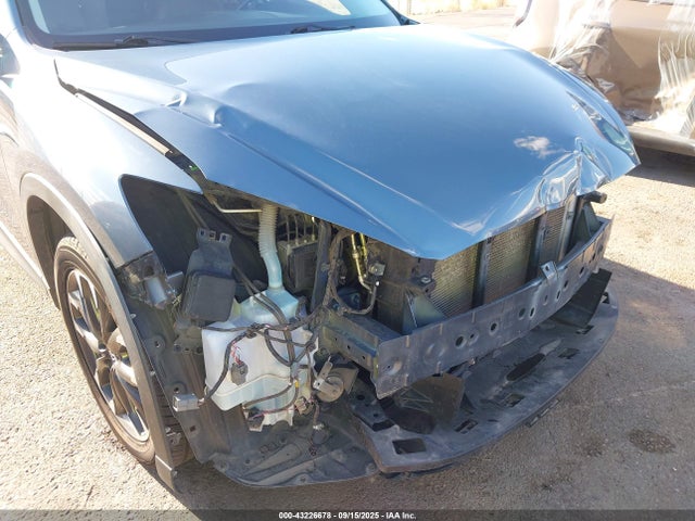 JM3KE4DY9G0788487 Mazda py