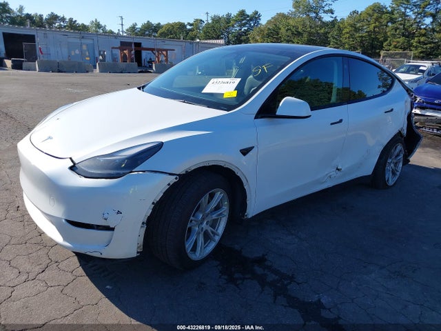 2023 TESLA MODEL Y 7SAYGDEE9PF703931 Photo 1