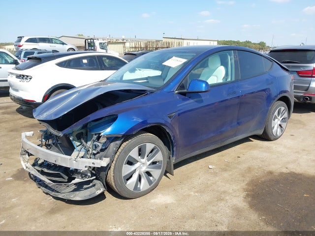 2023 TESLA MODEL Y 7SAYGDEE6PF615256 Photo 1